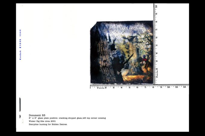 Glass plate R3 photographed on a white ground beside a ruler